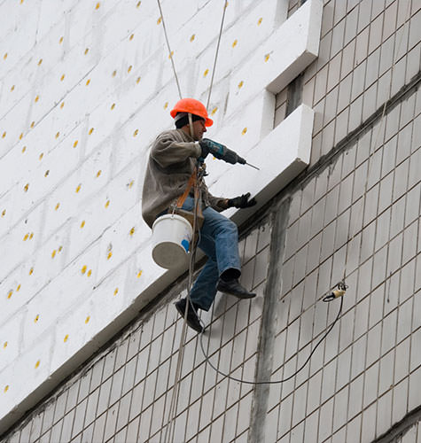Утепление фасада многоквартирного дома в Коряжме